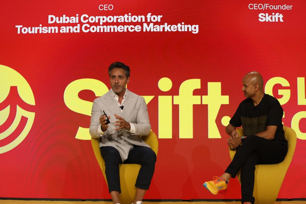 Dubai Tourism CEO Issam Abdul Rahim Kazim with Rafat Ali on stage at Skift Global Forum 2024