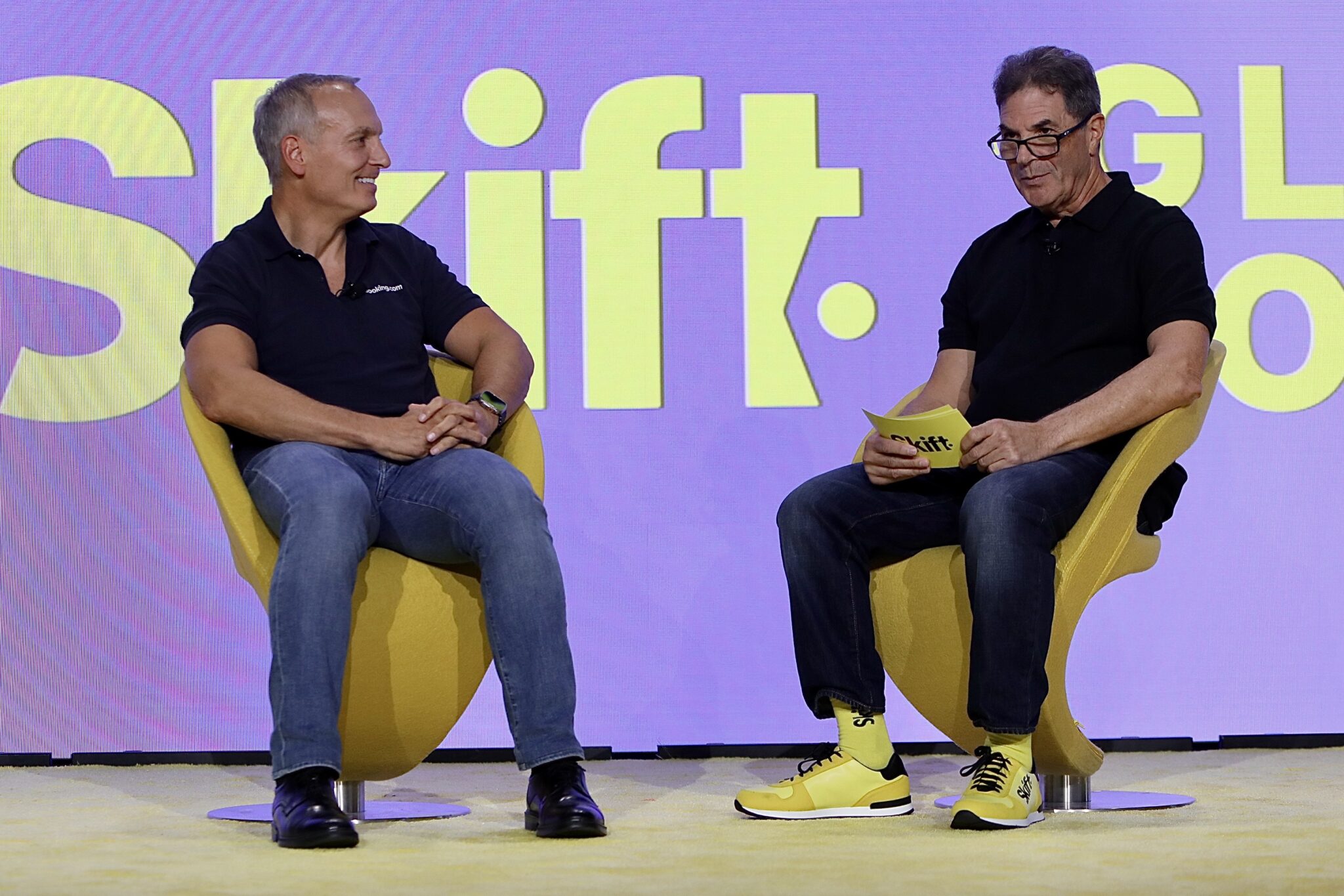 Two men in an in-stage interview session.