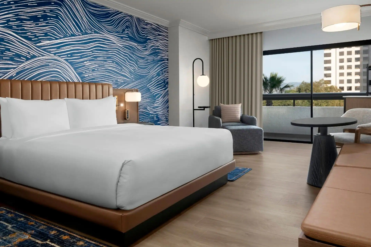 A king bedroom at the Hyatt Regency Irvine. Hyatt is deploying Sabre's Synxis central reservations system in many of its properties in 2024.