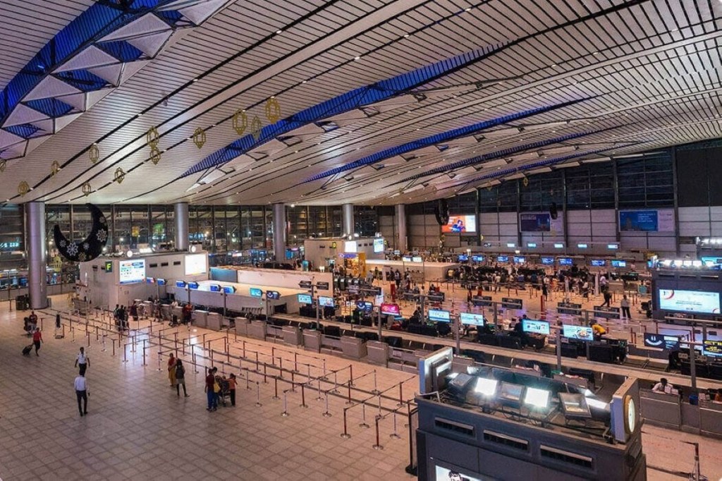 Travelers at the Hyderabad International Airport.