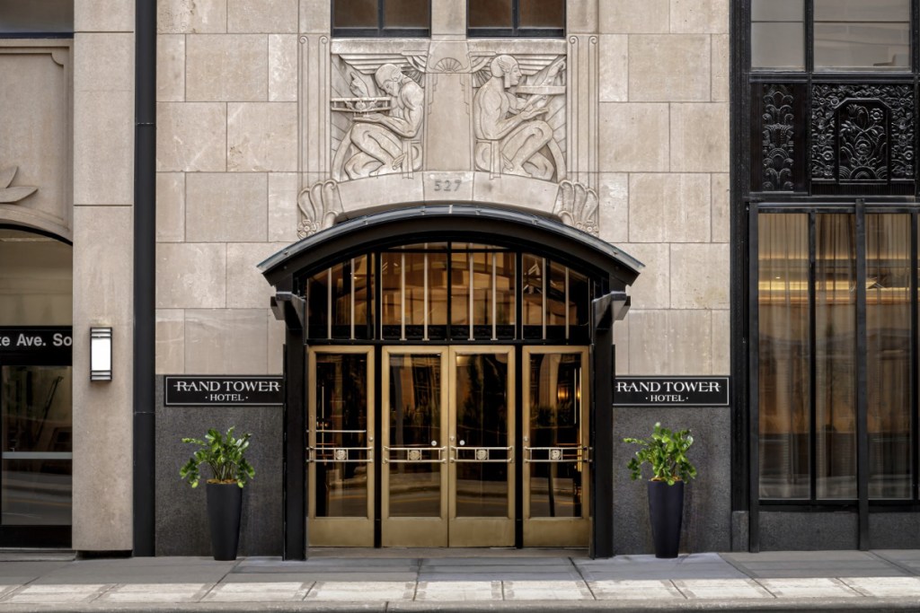 exterior of the entrance of the art deco hotel Rand Tower, Minneapolis a Tribute Portfolio Hotel marriott