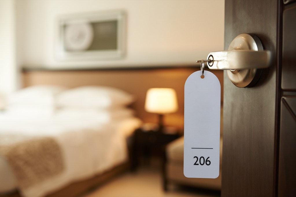 A open hotel room door.