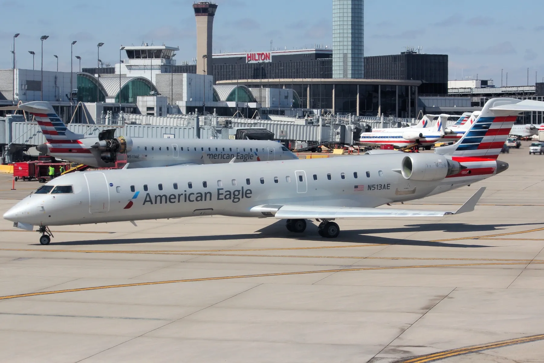 An airplane taxiing on the tarmac.