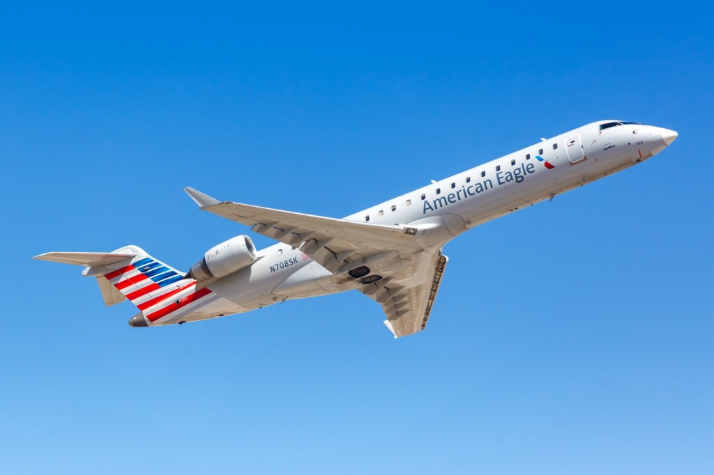 an airplane inflight in blue skies