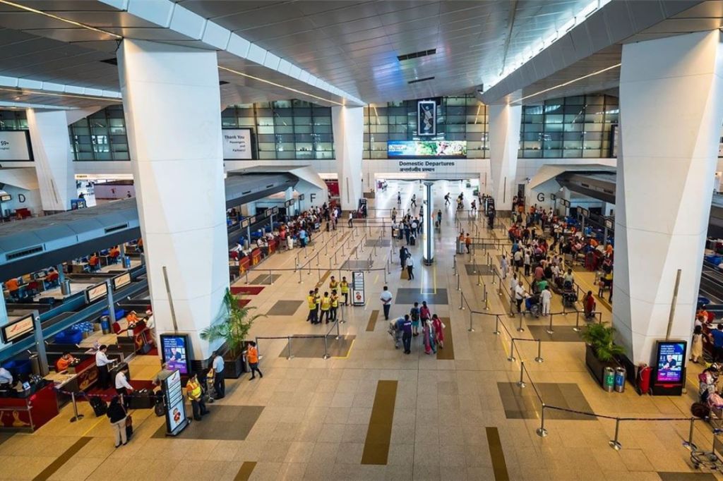 Passengers at the Indira Gandhi International Airport, New Delhi.