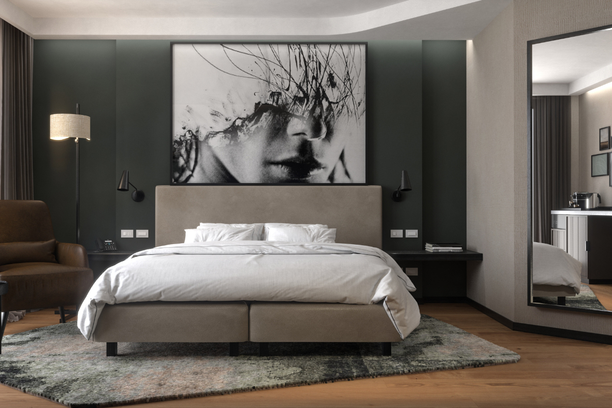 a view of a bed in a hotel guestroom run under the Radisson Blu brand