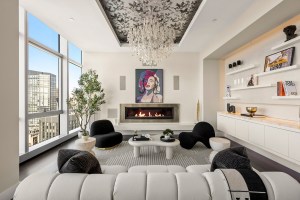 inside a branded residential apartment rental run under the W Hotels brand with eye-catching furniture and built-in shelves and unusual modern art on the walls